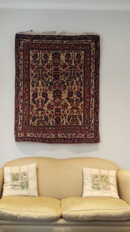 designing your room by hanging a rug